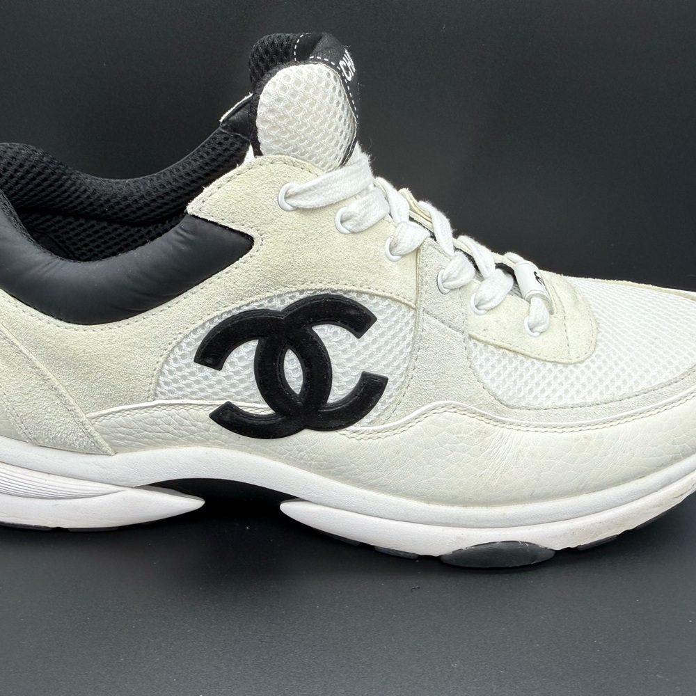 CHANEL White and Black High-Top Sneakers